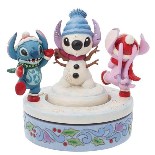 Disney Traditions Stitch and Angel Building a Stitch Snowman
