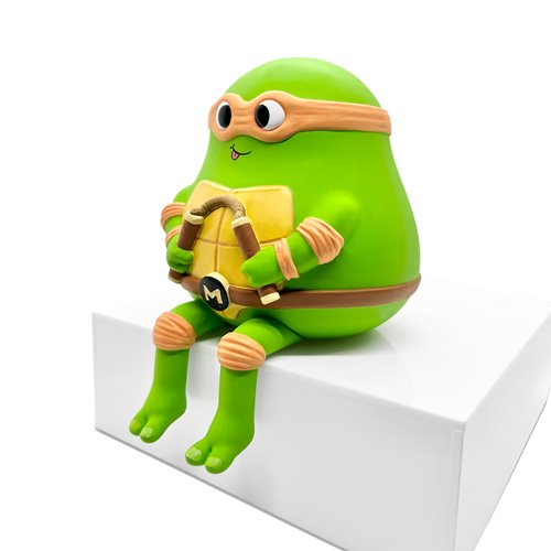 Teenage Mutant Ninja Turtles Sad Salesman Mikey Sitting Vinyl Figure