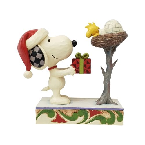 Peanuts Snoopy Giving Woodstock a Gift a Snowy Gift Statue by Jim Shore
