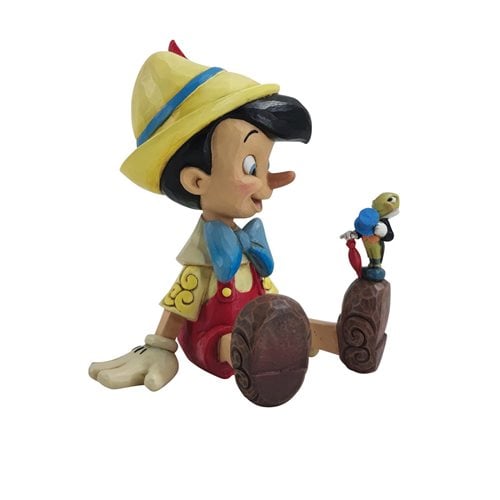 Disney Traditions Pinocchio and Jiminy Cricket Sitting by Jim Shore Statue