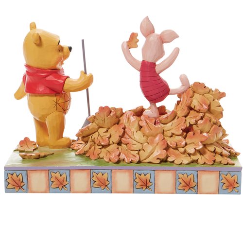 Disney Traditions Winnie the Pooh and Piglet Jumping into Fall by Jim Shore Statue