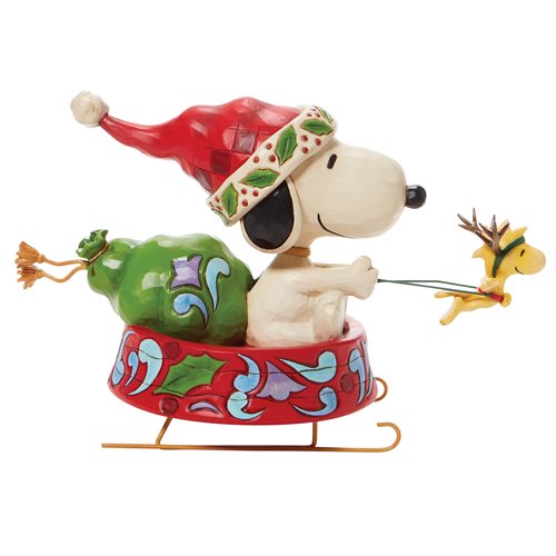 Peanuts Santa Snoopy in Dog Bowl Sled Dashing Through the Holidays by Jim Shore Statue